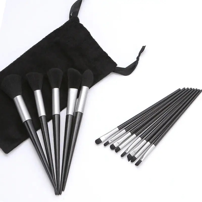 the makeup brush set is shown with a black bag