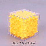 a cube shaped puzzle with a yellow cube inside