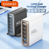 140W GaN desktop charger with multiple USB ports available in black and white colors.