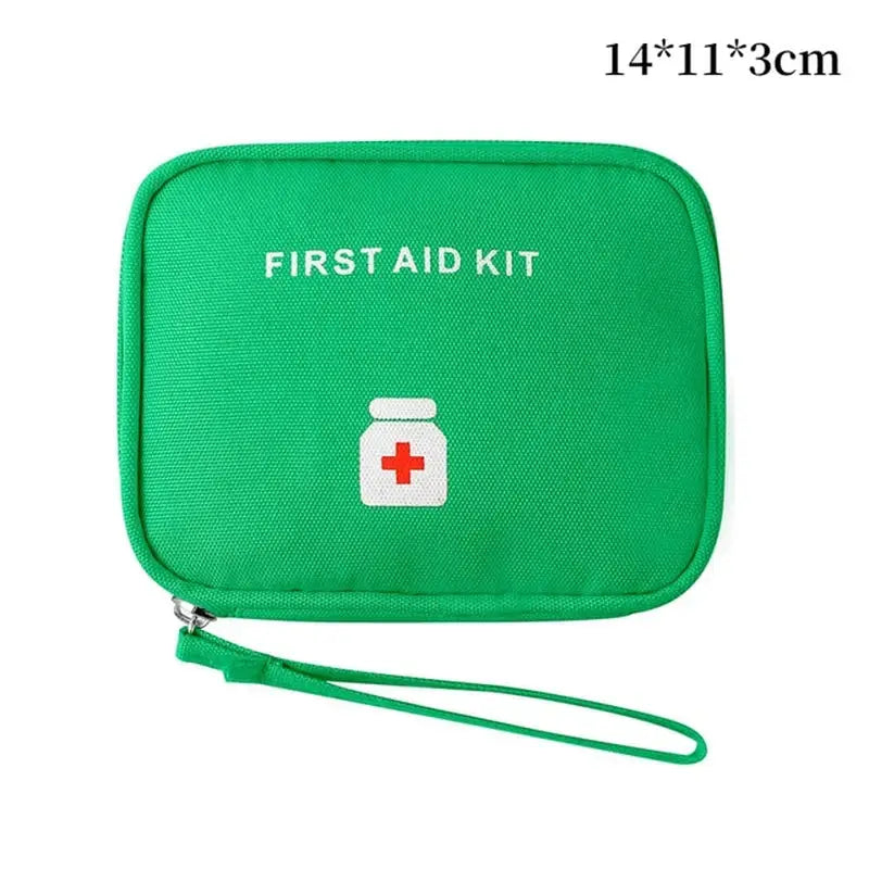 a close up of a green first aid kit with a red cross on it