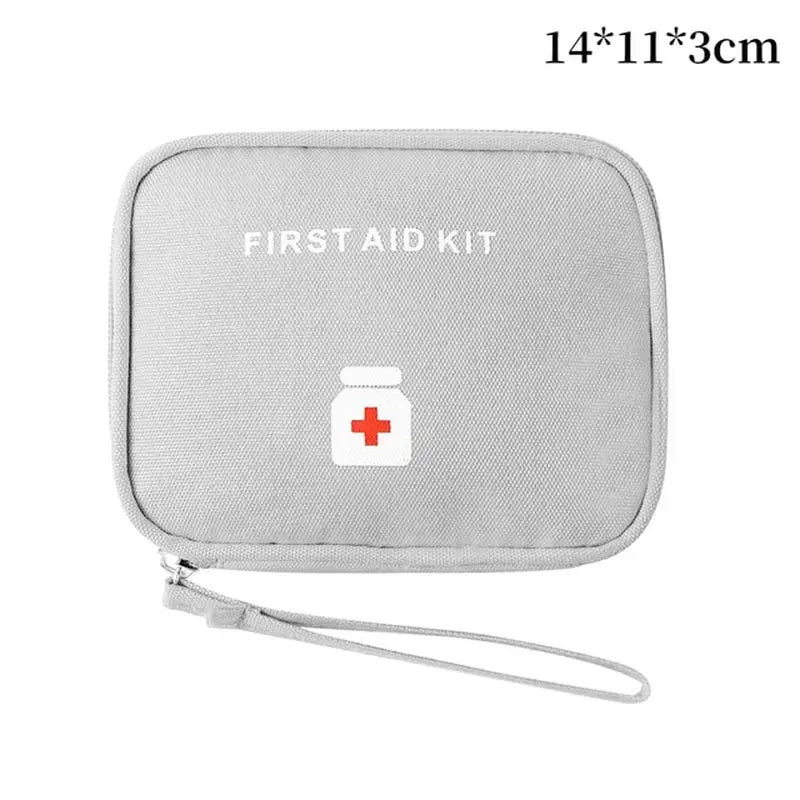 a close up of a first aid kit with a red cross on it