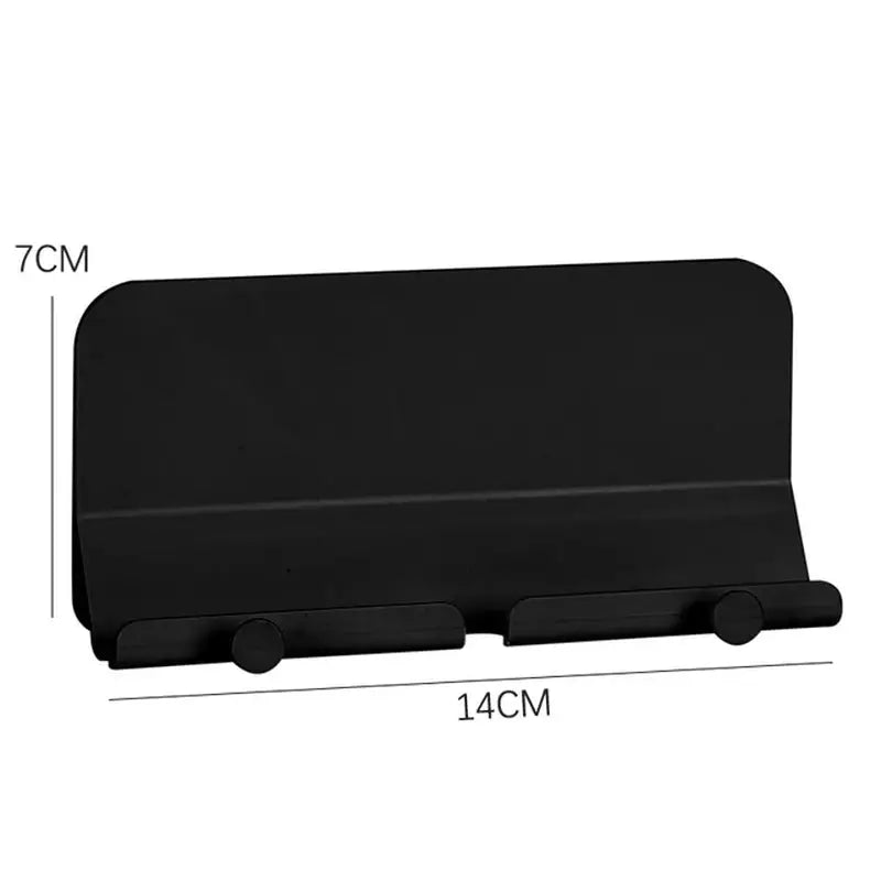 a black plastic business card holder with a white background