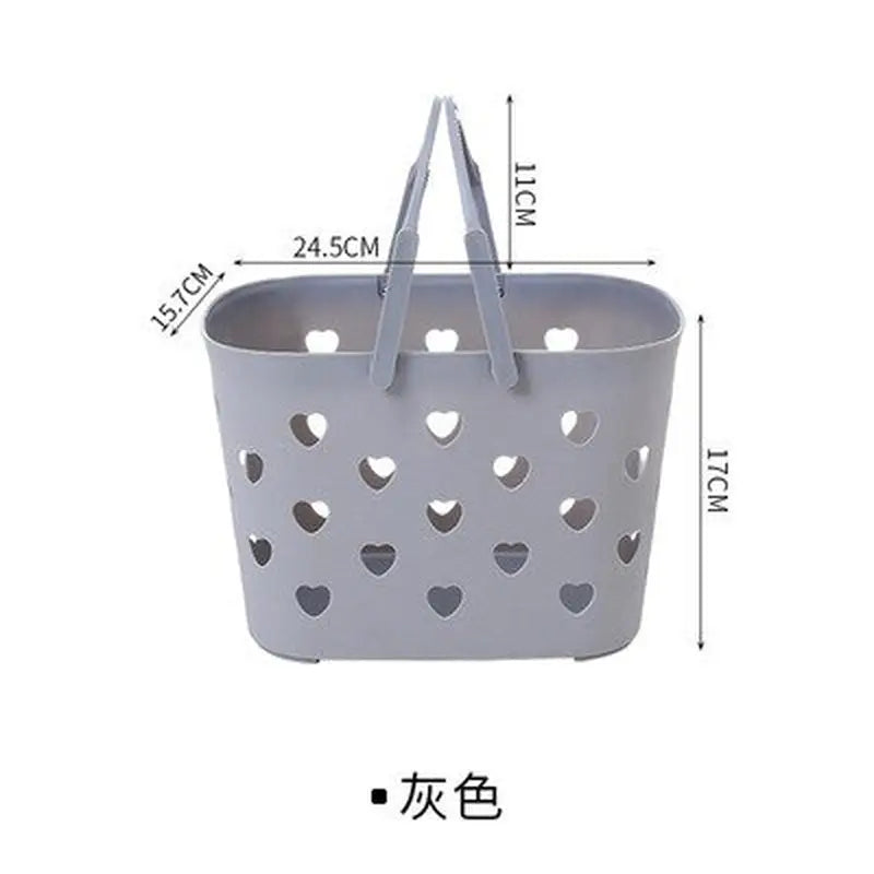 a gray plastic basket with hearts on it