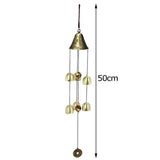 the bell bell wind chime is a brass bell bell with five bells
