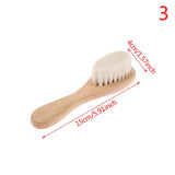 a wooden brush with a white bristles on it