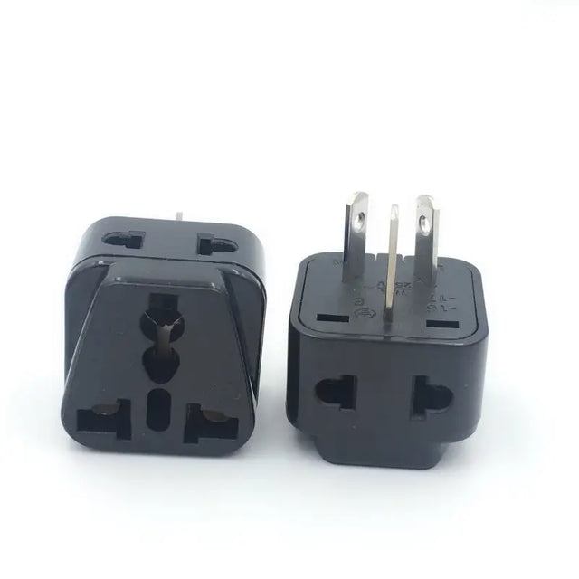 two black plugs on a white background