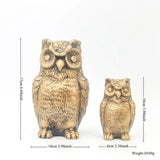 two owls figs with their eyes closed