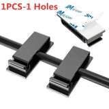 a pair of black plastic cable ties