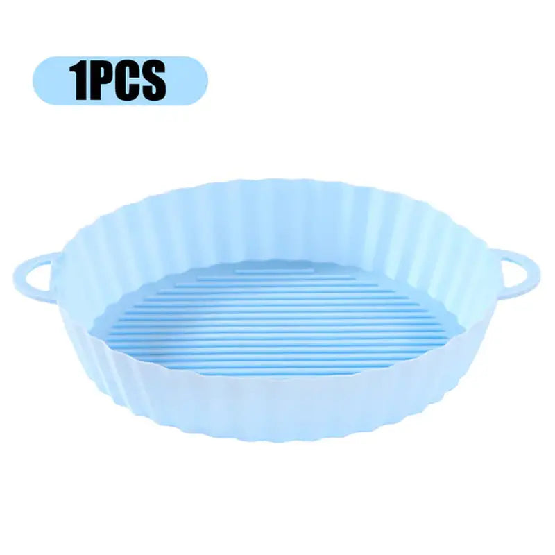 a blue plastic baking dish with a white background