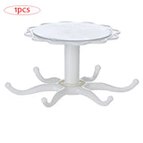 a white plastic table with a white base