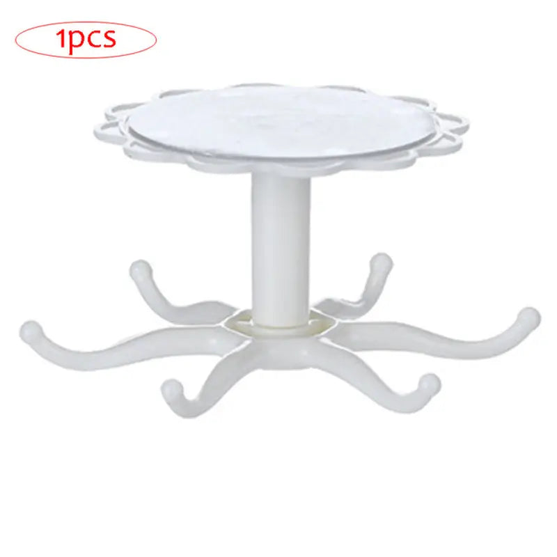 a white plastic table with a white base