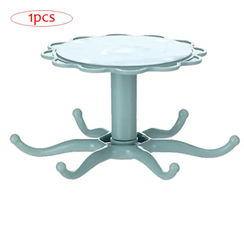 a white plastic table with a metal base