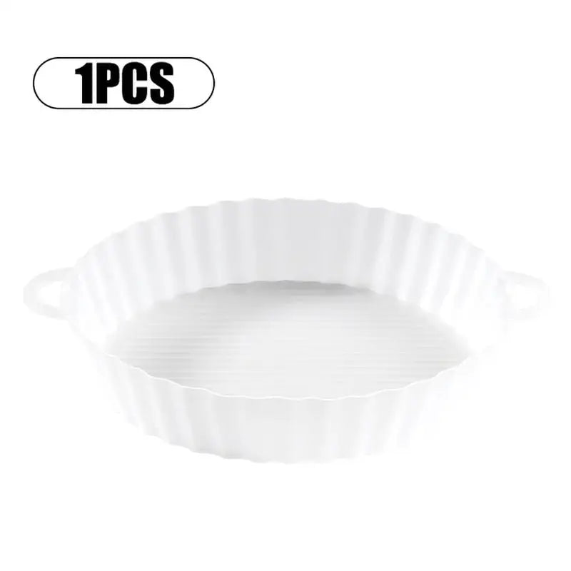 a white paper pie pan with a white background