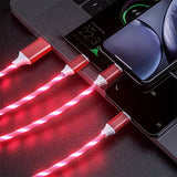 a red led light is being used to charge the iphone