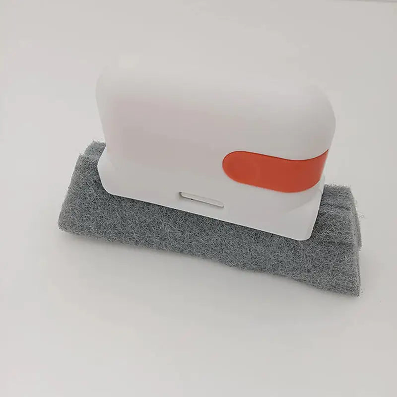 a white and red sponge on a white surface