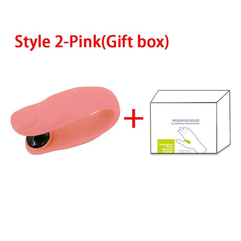 a pink shoe with a box and a white box