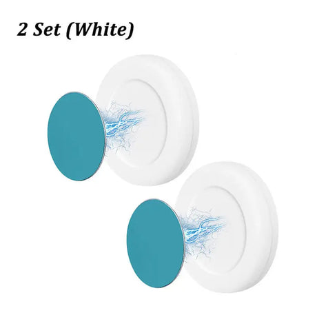 two white and blue plates with blue rims on them