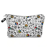 a white zipper bag with a pattern of various items on it