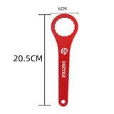 a red bottle opener with the number 20 on it