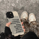 a person holding a phone case with the words can you ever be who you should?