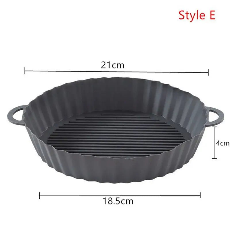 a close up of a pan with a grill on it