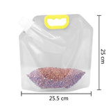 a clear plastic bag with a yellow handle