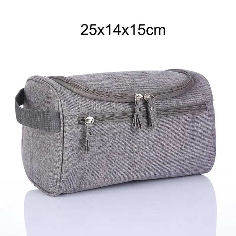 the travel toilet bag is made from a grey fabric