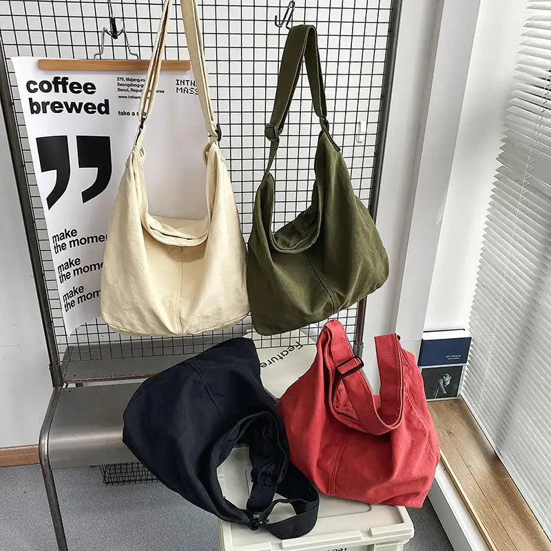 three bags hanging on a wall