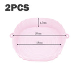 a pink plastic bowl with measurements