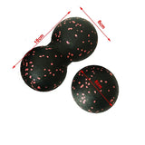 two black and pink polka dot balls