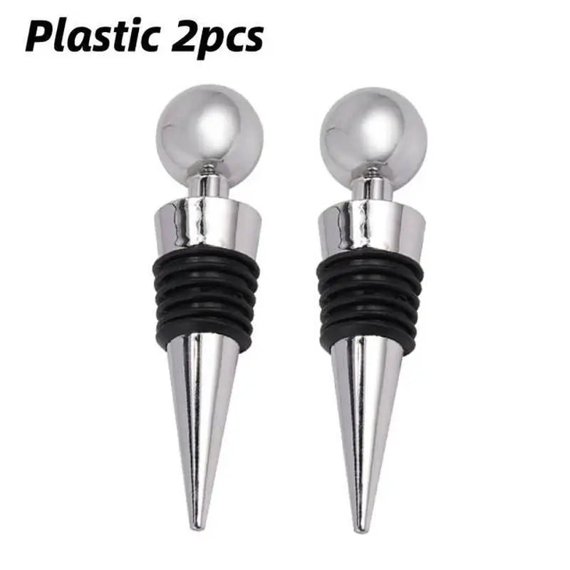 a pair of silver and black plastic wine stoppers