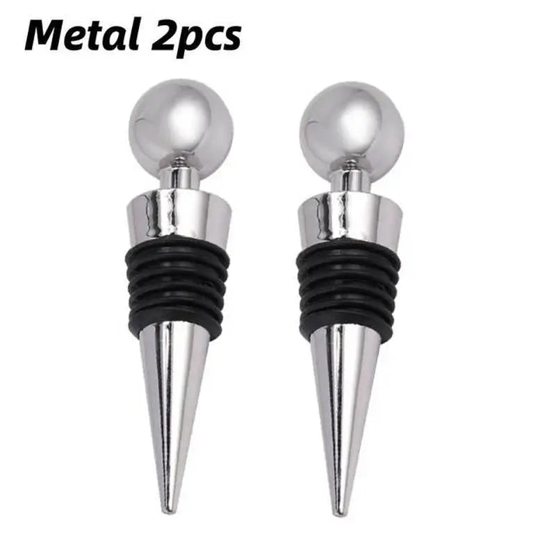 a pair of metal spike earrings with black rubber