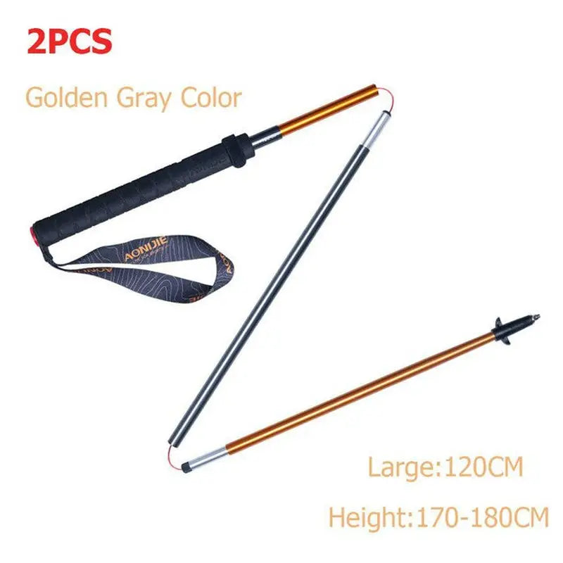 a pair of two metal poles with a black and orange handle