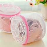 two mesh bags with pink handles