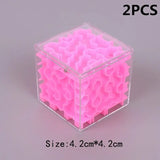 a pink cube shaped object with a white background