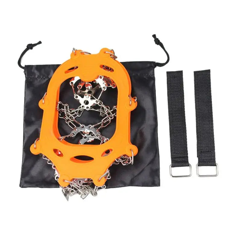 a black bag with a chain and a orange cara
