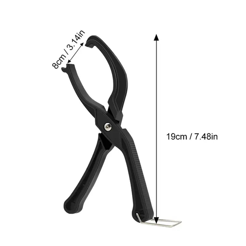 a black pliers with a white background