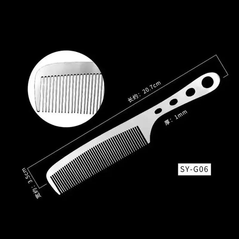 a close up of a comb and a ruler on a black background