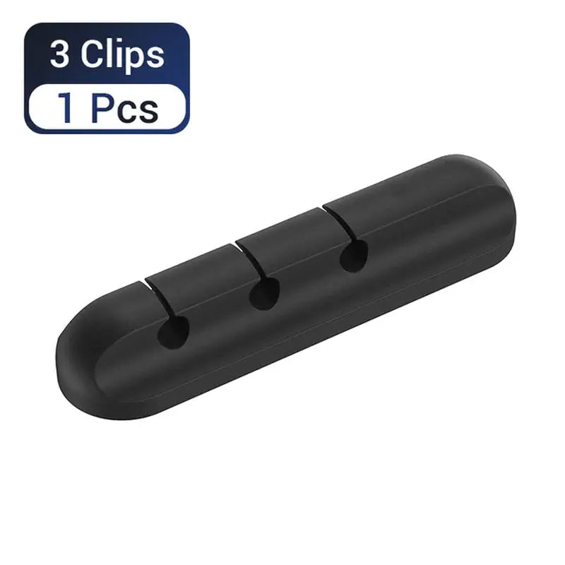 a black plastic tube with three holes