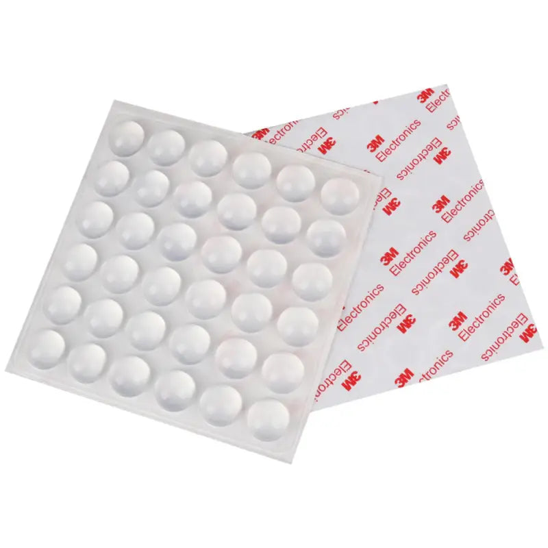 a close up of a package of pills on a white background