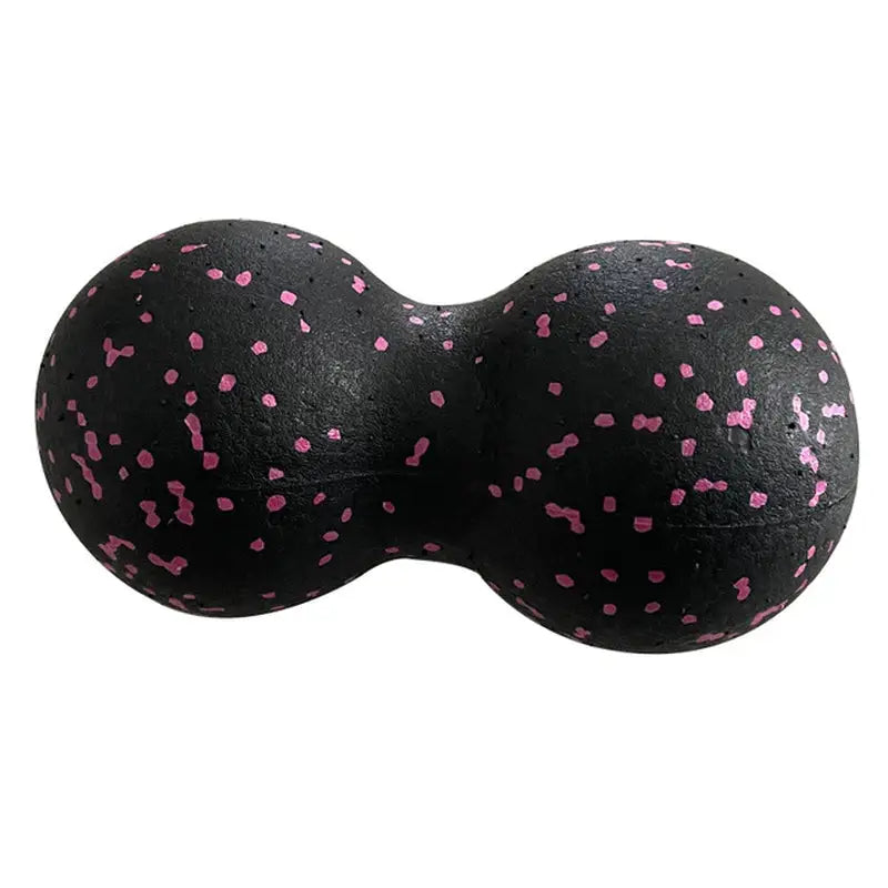 a black and pink ball with pink spots