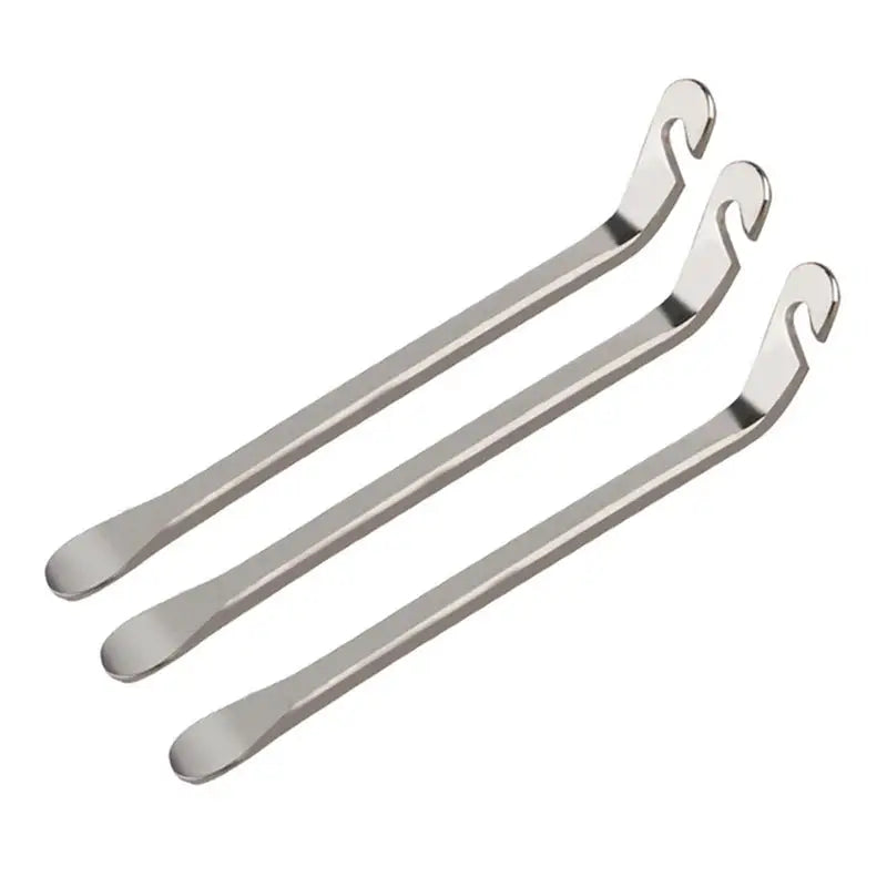 a pair of stainless steel tongs