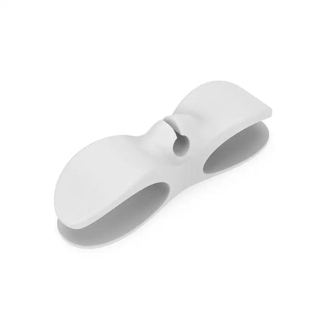 a white plastic object on a white background