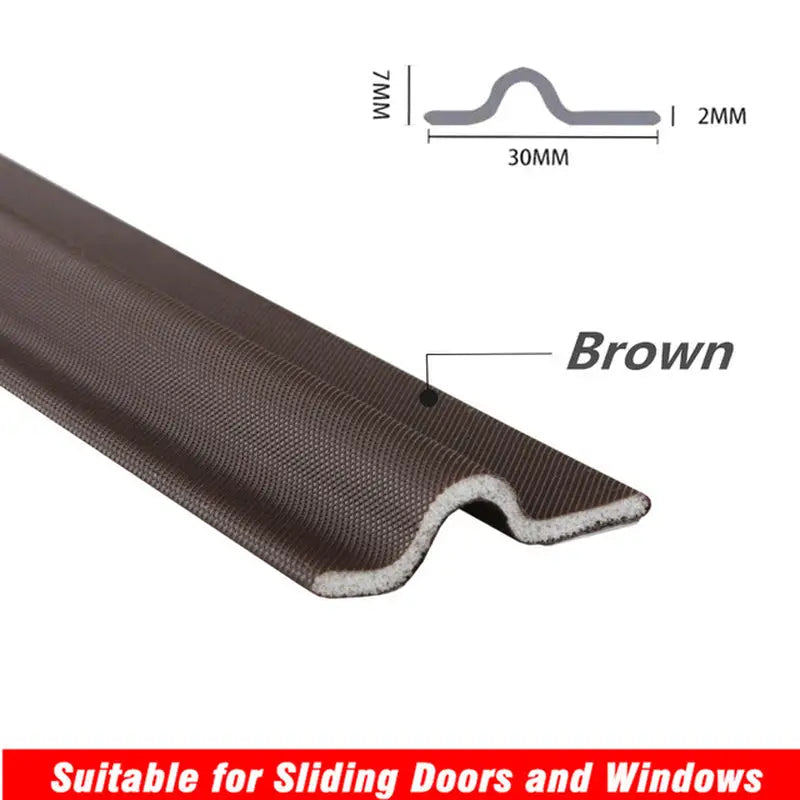 a close up of a brown door seal with a white background