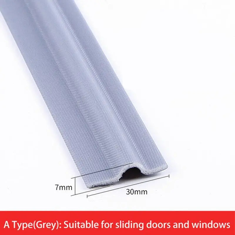 a roll of grey fabric with a white background