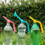 three plastic bottles with a straw and a straw