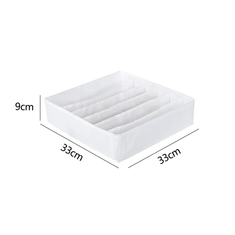 a white plastic storage box with three compartments