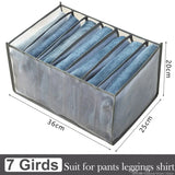 a large storage box with six pairs of jeans inside