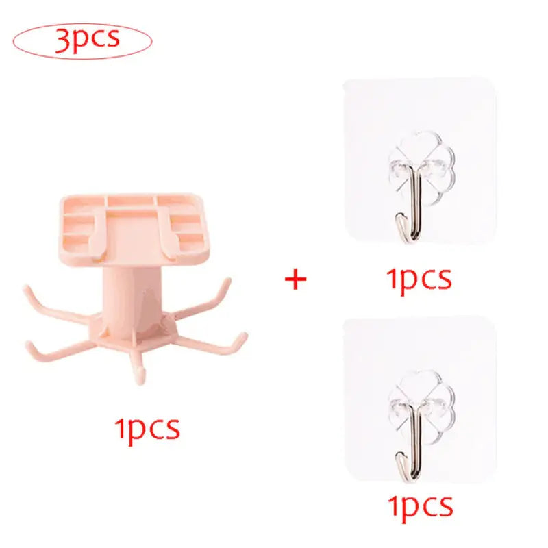 three pieces of pink plastic hooks with a white background
