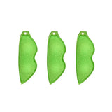 three green leaf shaped plastic charms